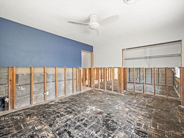 unfurnished room with a ceiling fan