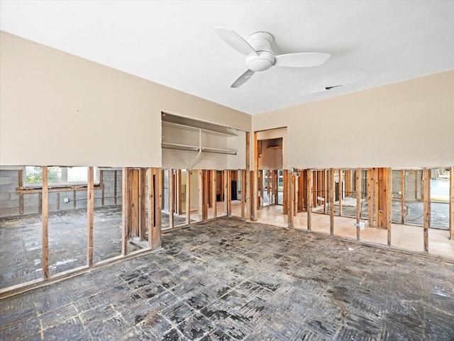 spare room with a ceiling fan
