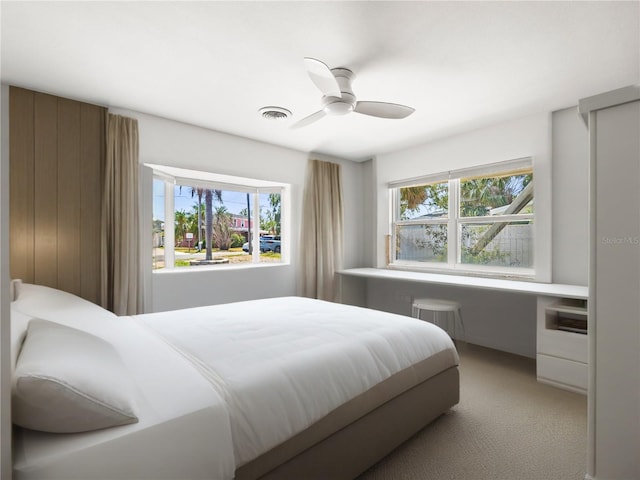 bedroom featuring carpet floors and ceiling fan