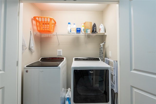 17847 Althea Blue Pl, Lutz, FL 33558 - laundry room featuring independent washer and dryer