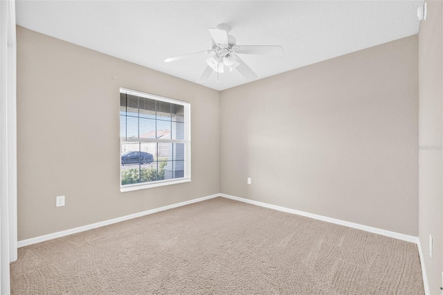 6937 Gideon Cir, Zephyrhills, FL 33541 - unfurnished room with carpet, baseboards, and ceiling fan