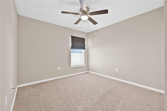 6937 Gideon Cir, Zephyrhills, FL 33541 - spare room featuring a ceiling fan, carpet, and baseboards