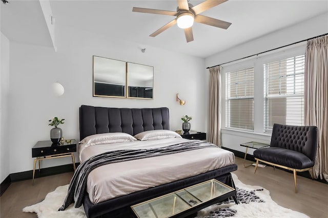219 4th Ave N Unit 201, Saint Petersburg, FL 33701 - bedroom featuring wood finished floors, baseboards, and ceiling fan