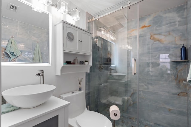 219 4th Ave N Unit 201, Saint Petersburg, FL 33701 - bathroom featuring a shower stall, vanity, and toilet