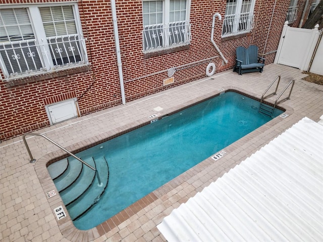 219 4th Ave N Unit 201, Saint Petersburg, FL 33701 - community pool featuring a patio area
