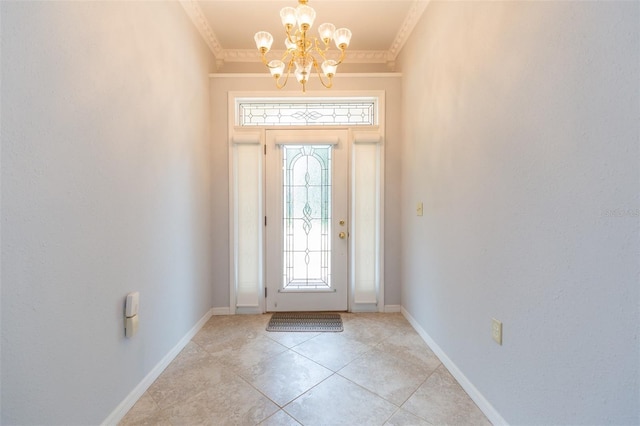 foyer featuring a chandelier, crown molding, baseboards, and light tile patterned flooring