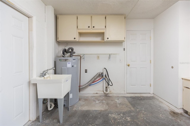 laundry area featuring cabinet space and water heater