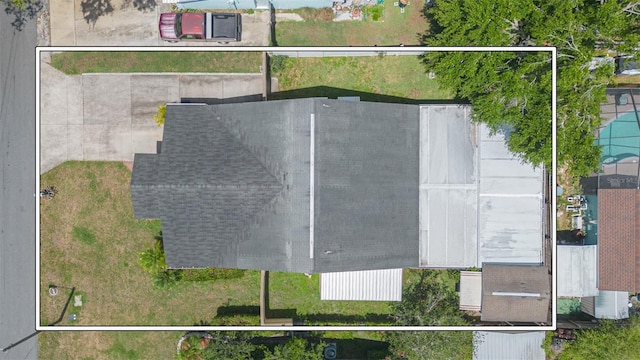 aerial view of property and surrounding area with property parcel outlined