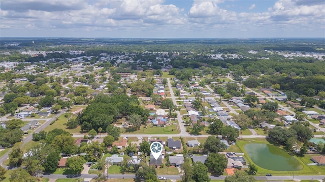 view of property location with nearby suburban area and a nearby body of water