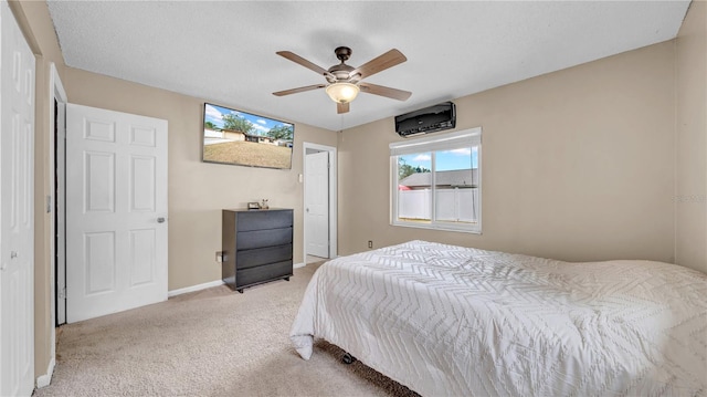 bedroom with carpet flooring, baseboards, and ceiling fan