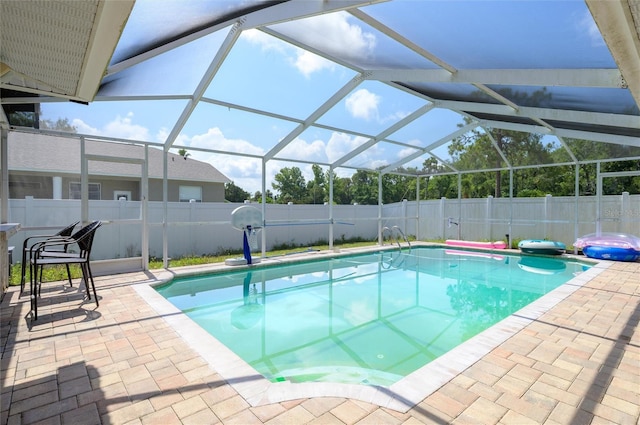 10149 Briar Cir, Hudson, FL 34667 - view of swimming pool featuring a fenced backyard, a patio area, and a lanai