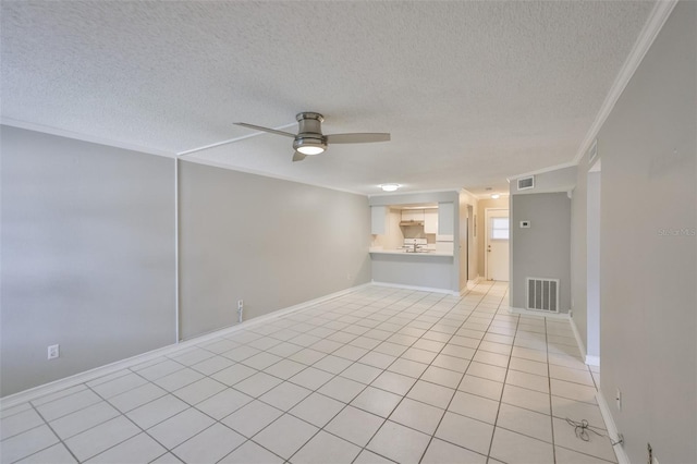 4801 W Mcelroy Ave Unit D104, Tampa, FL 33611 - unfurnished living room featuring ceiling fan, a textured ceiling, crown molding, light tile patterned floors, and baseboards