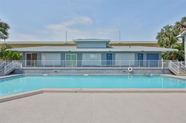 4801 W Mcelroy Ave Unit D104, Tampa, FL 33611 - community pool with stairs and a patio