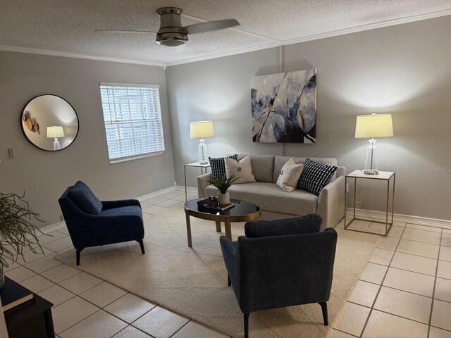 4801 W Mcelroy Ave Unit D104, Tampa, FL 33611 - living area with crown molding, light tile patterned floors, ceiling fan, a textured ceiling, and baseboards