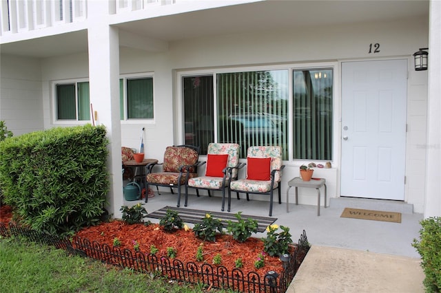 2020 World Parkway Blvd Unit 12, Clearwater, FL 33763 - view of exterior entry featuring covered porch