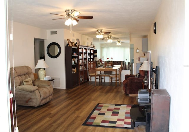 2020 World Parkway Blvd Unit 12, Clearwater, FL 33763 - living room with a ceiling fan and wood finished floors