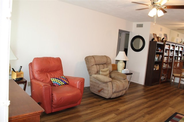 2020 World Parkway Blvd Unit 12, Clearwater, FL 33763 - sitting room featuring a ceiling fan and wood finished floors
