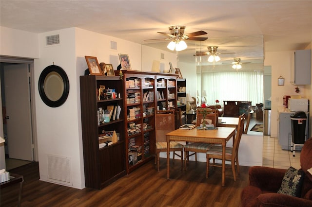 2020 World Parkway Blvd Unit 12, Clearwater, FL 33763 - dining room featuring ceiling fan and wood finished floors