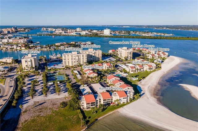 drone / aerial view of a large body of water and apartment complex