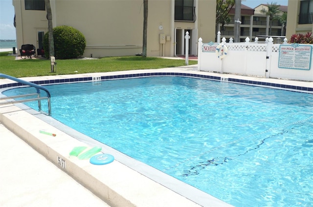community pool with fence