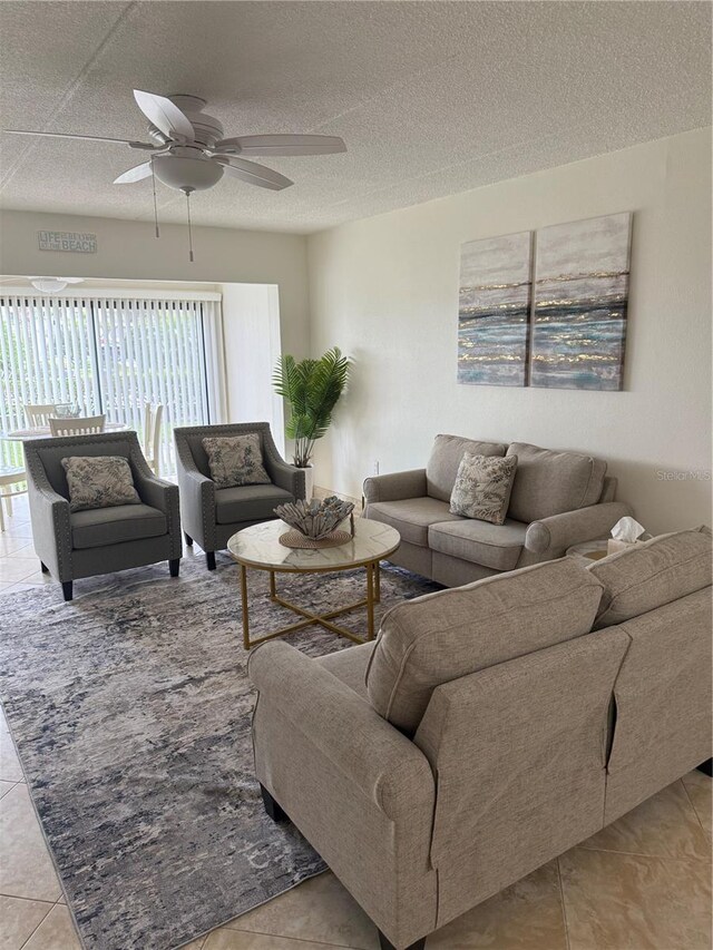 845 S Gulfview Blvd Unit 110, Clearwater Beach, FL 33767 - tiled living room featuring a ceiling fan