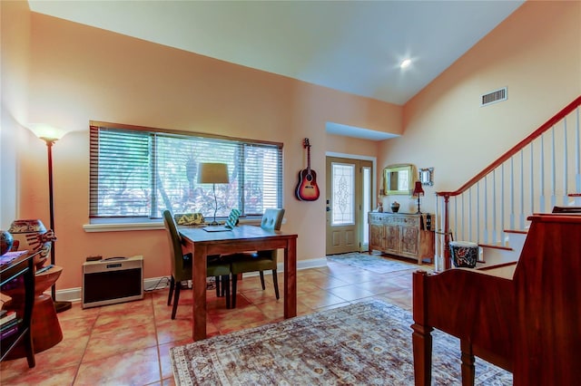 3406 Hollyhock Way, Tampa, FL 33618 - tiled foyer entrance with high vaulted ceiling, baseboards, and stairs