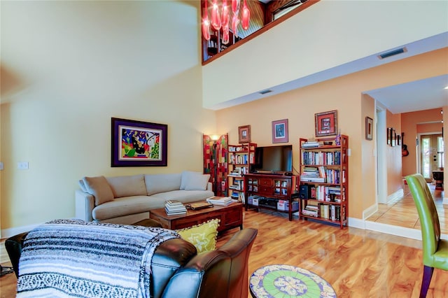 3406 Hollyhock Way, Tampa, FL 33618 - living room with wood finished floors and baseboards