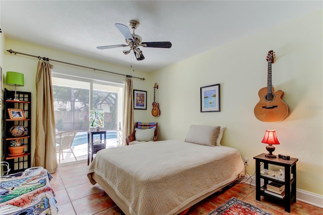 3406 Hollyhock Way, Tampa, FL 33618 - bedroom featuring access to outside, light tile patterned floors, and a ceiling fan