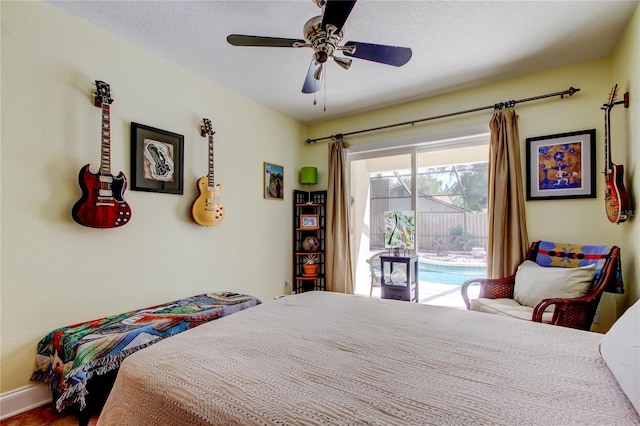 3406 Hollyhock Way, Tampa, FL 33618 - bedroom featuring access to outside, a ceiling fan, and baseboards
