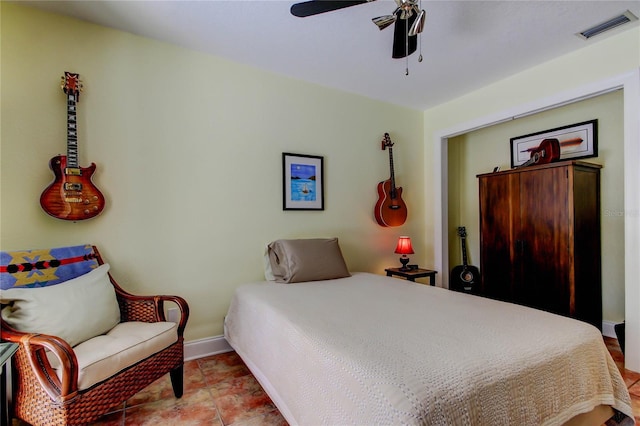 3406 Hollyhock Way, Tampa, FL 33618 - bedroom featuring baseboards and a ceiling fan