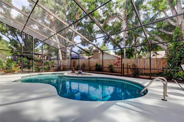 3406 Hollyhock Way, Tampa, FL 33618 - view of pool with a fenced backyard, glass enclosure, and a patio