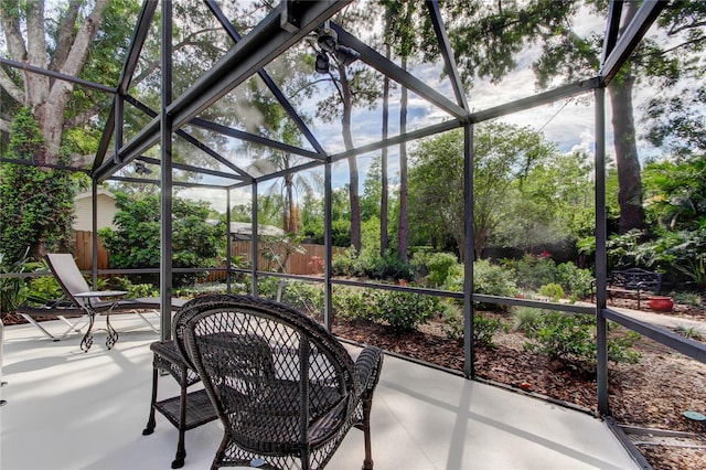 3406 Hollyhock Way, Tampa, FL 33618 - sunroom / solarium with view of wooded area