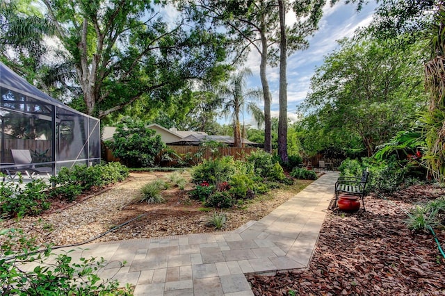 3406 Hollyhock Way, Tampa, FL 33618 - surrounding community with a fenced backyard and a patio
