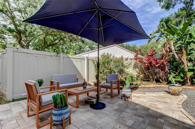3406 Hollyhock Way, Tampa, FL 33618 - view of patio featuring a fenced backyard and outdoor lounge area