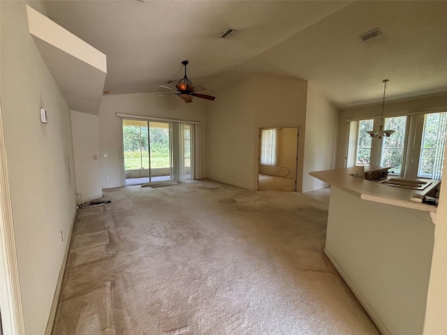 2846 N Kittery Pt, Hernando, FL 34442 - unfurnished living room featuring lofted ceiling, light colored carpet, and ceiling fan