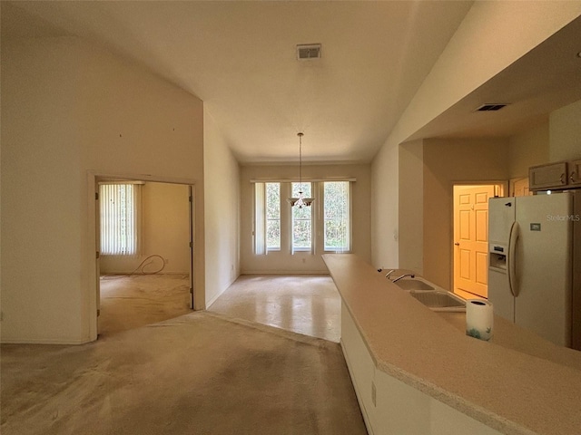2846 N Kittery Pt, Hernando, FL 34442 - unfurnished dining area with light colored carpet and a chandelier