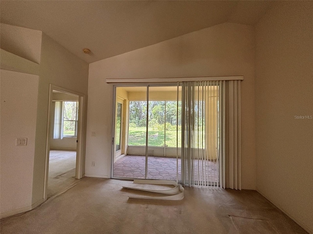 2846 N Kittery Pt, Hernando, FL 34442 - entryway featuring lofted ceiling and carpet floors