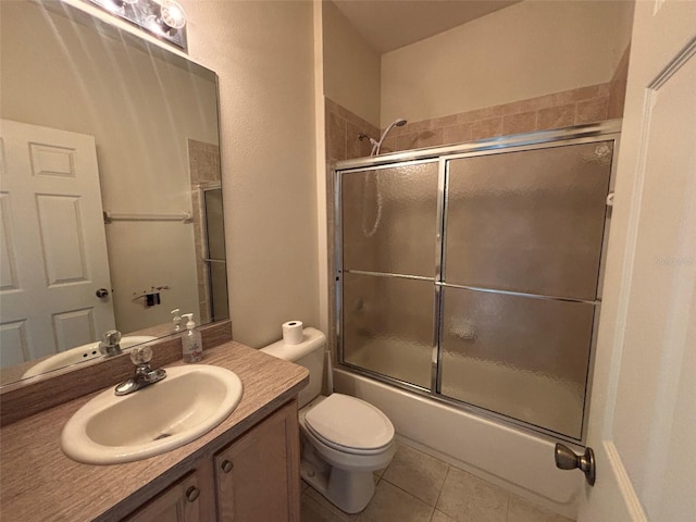 2846 N Kittery Pt, Hernando, FL 34442 - full bath with tile patterned flooring, toilet, combined bath / shower with glass door, and vanity