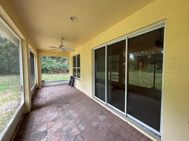 2846 N Kittery Pt, Hernando, FL 34442 - unfurnished sunroom featuring a ceiling fan