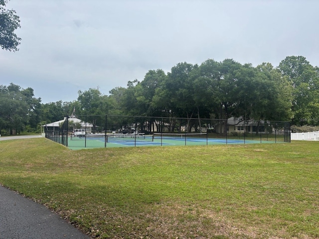 2846 N Kittery Pt, Hernando, FL 34442 - view of tennis court with view of wooded area