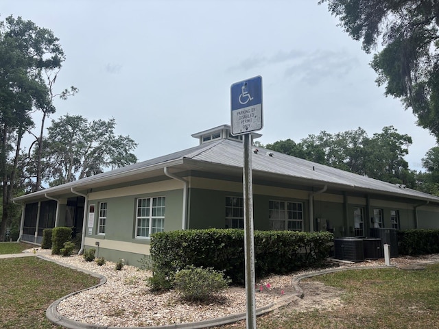 2846 N Kittery Pt, Hernando, FL 34442 - view of property exterior with central AC and stucco siding