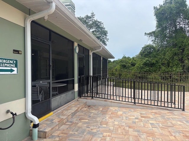 2846 N Kittery Pt, Hernando, FL 34442 - view of patio / terrace featuring a sunroom