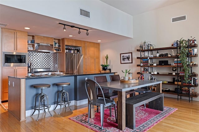 1208 E Kennedy Blvd Unit 831, Tampa, FL 33602 - dining space featuring light wood-style floors