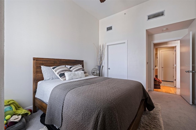 1208 E Kennedy Blvd Unit 831, Tampa, FL 33602 - bedroom featuring high vaulted ceiling, carpet, and a ceiling fan