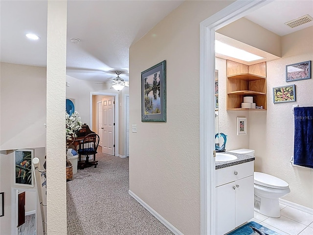 1628 Lullwater Ln, Lutz, FL 33549 - hallway with a textured wall and baseboards