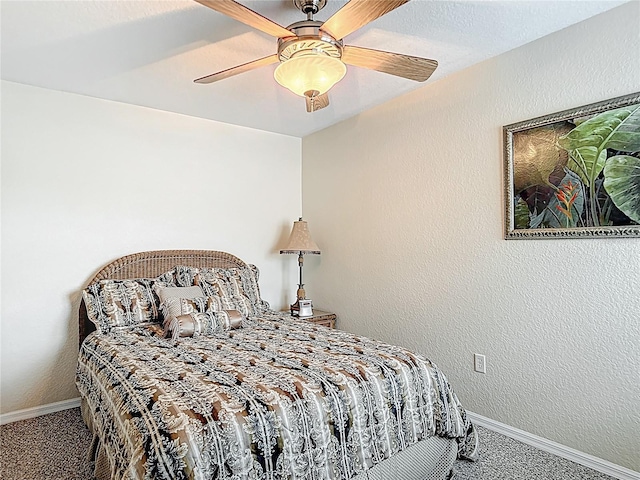 1628 Lullwater Ln, Lutz, FL 33549 - carpeted bedroom with baseboards and ceiling fan