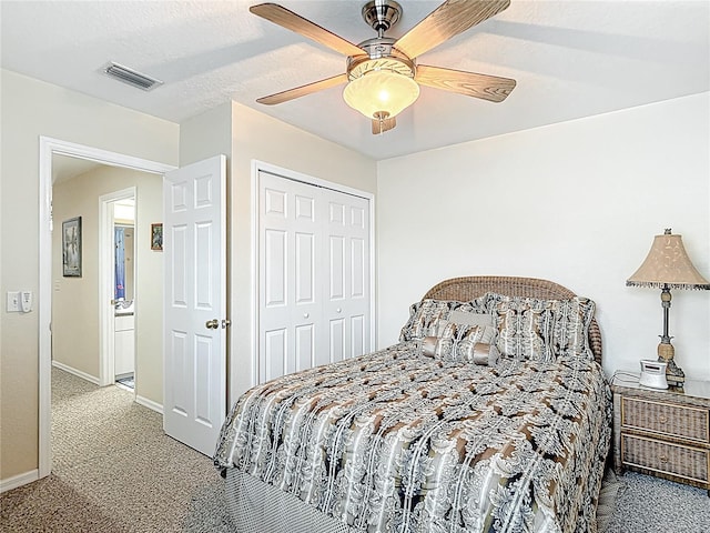 1628 Lullwater Ln, Lutz, FL 33549 - bedroom with light colored carpet, a closet, a ceiling fan, and baseboards