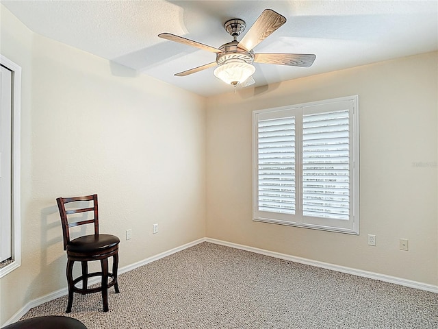 1628 Lullwater Ln, Lutz, FL 33549 - spare room with carpet flooring, ceiling fan, and baseboards