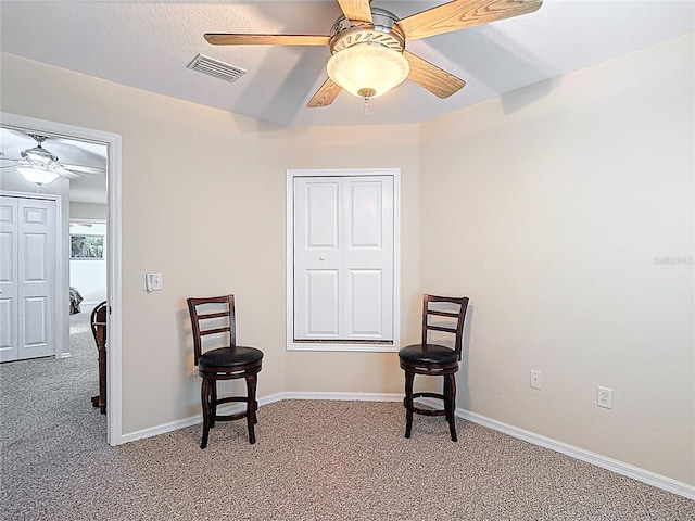 1628 Lullwater Ln, Lutz, FL 33549 - living area with light colored carpet, ceiling fan, and baseboards