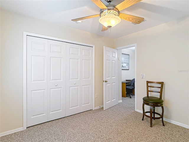 1628 Lullwater Ln, Lutz, FL 33549 - bedroom with a closet, baseboards, a desk, light colored carpet, and ceiling fan